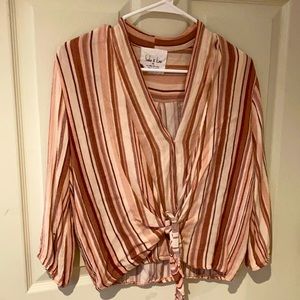 Pink V-neck striped blouse